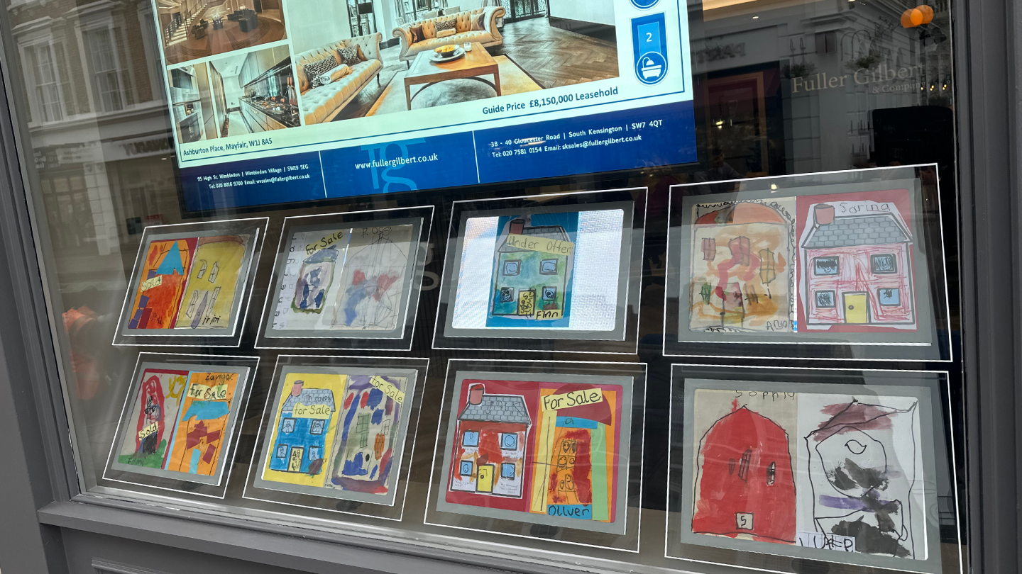 The Willcocks Nursery display their property window cards at Fuller Gilbert Estate Agents